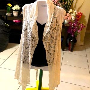 Asymmetrical sleeveless Cardigan